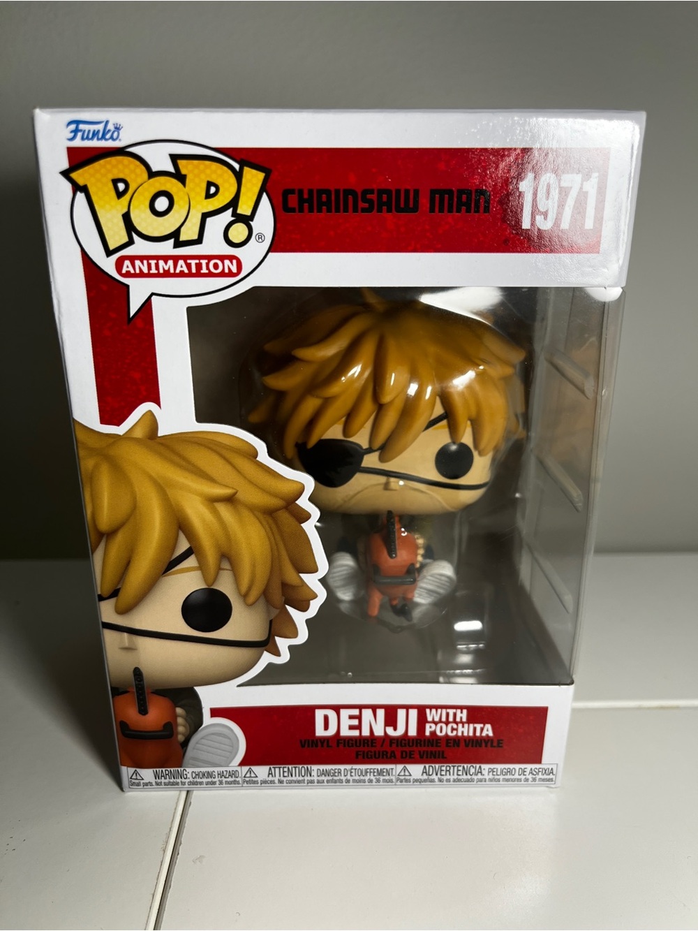 Funko Denji with Pochita Vinyl Figure - Yellow Hair, Orange Outfit
